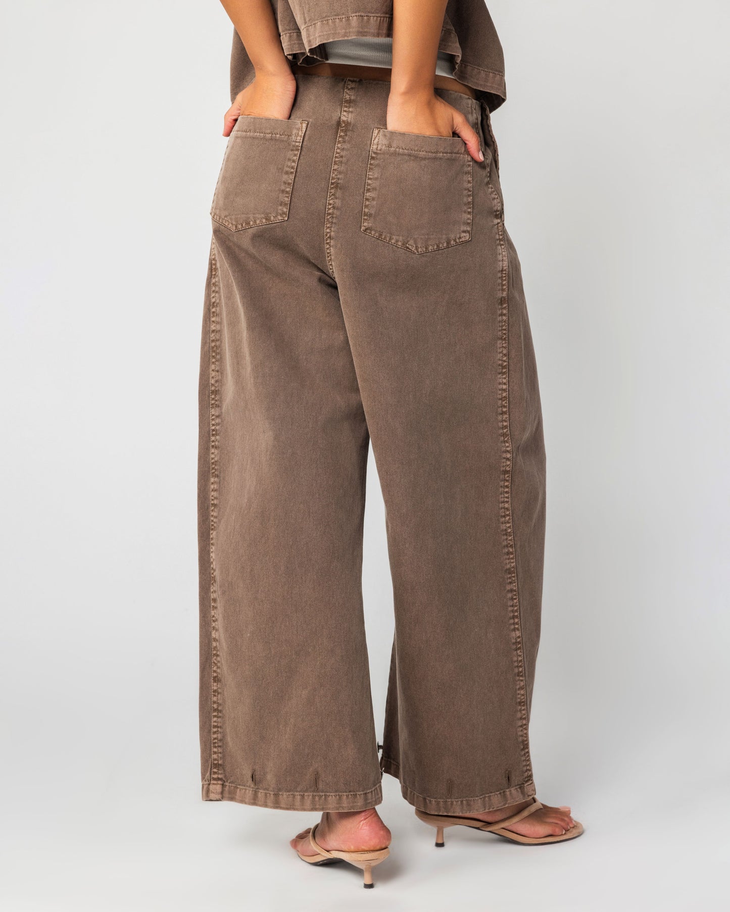 NOMAD - Cropped Wide leg Pleated Pants